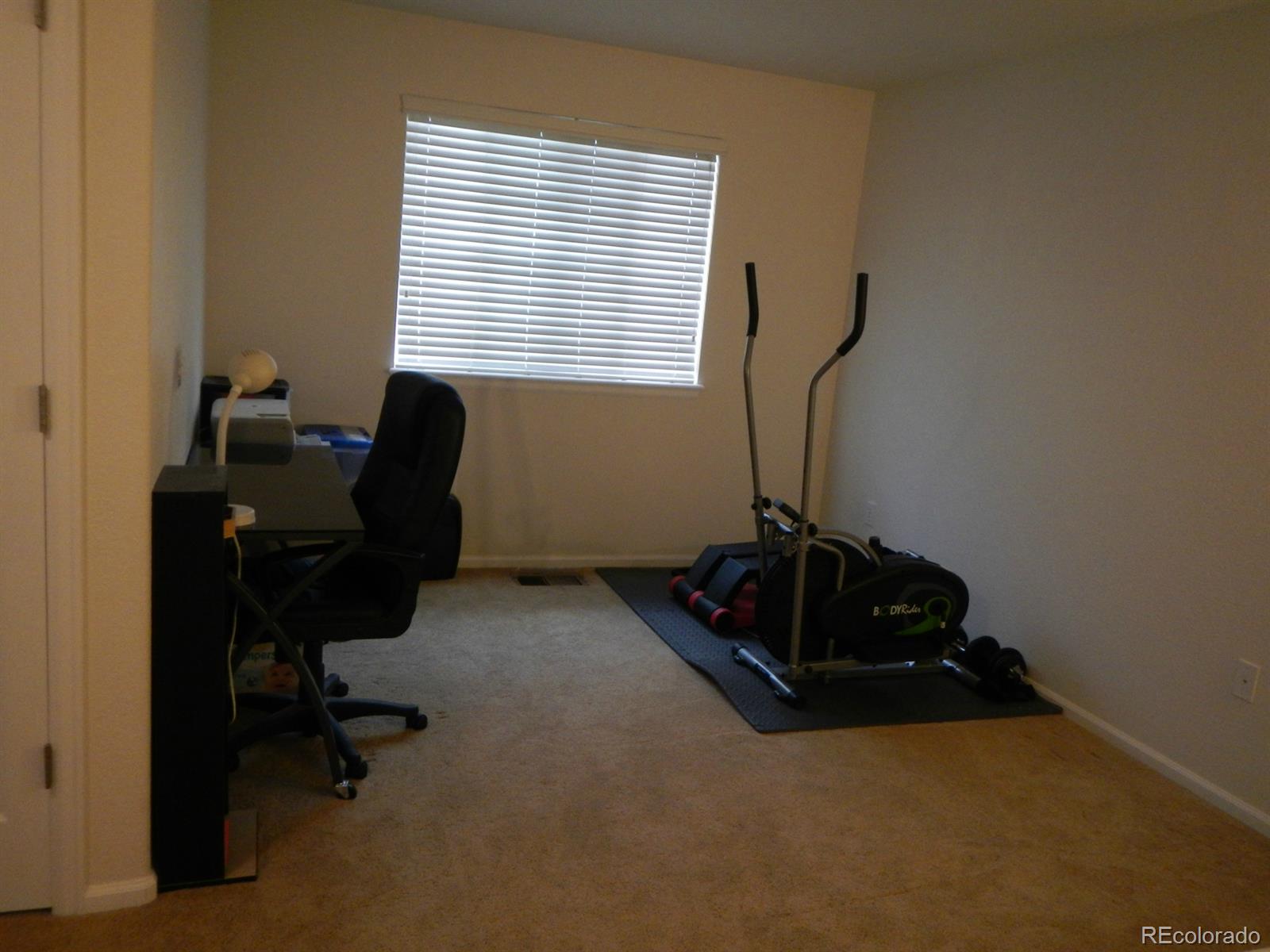 3652 South Perth Circle, Unit 102 Aurora, CO 80013 - Photo 10 of 17 a room with musical instruments
