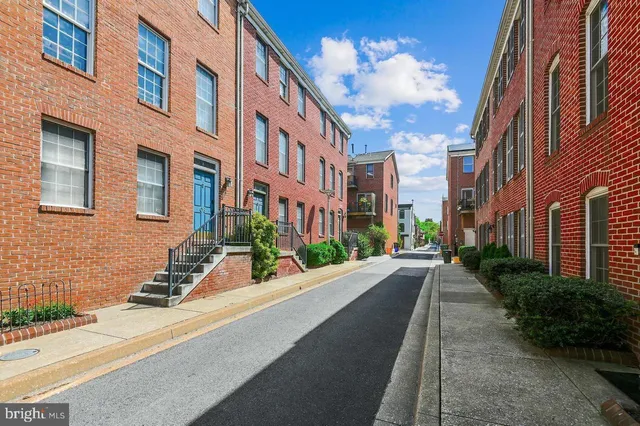 a view of a building with a street