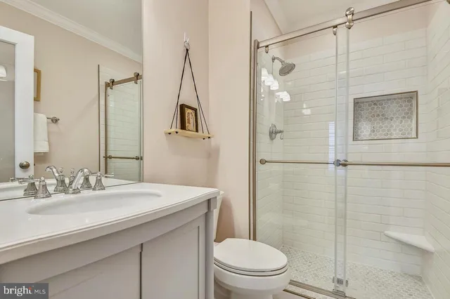 a bedroom with bed and window