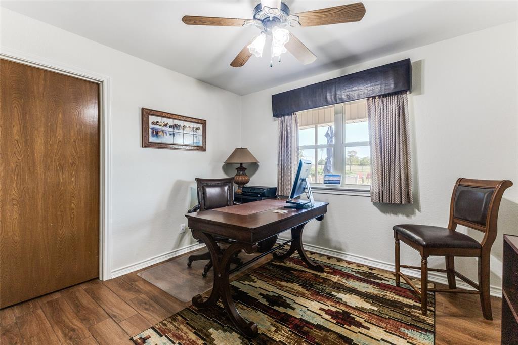 2525 Private Road 6040 Blue Ridge, TX 75424 - Photo 20 of 40 a view of a workspace with furniture and a window