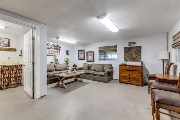 a living room with furniture and a couch