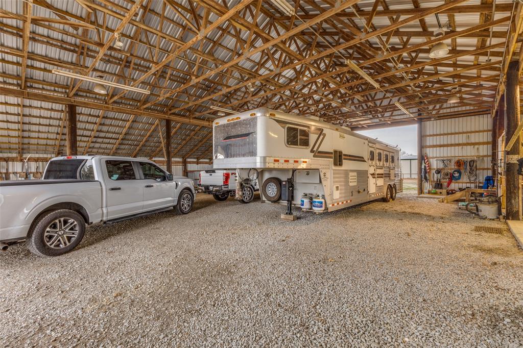 2525 Private Road 6040 Blue Ridge, TX 75424 - Photo 31 of 40 a utility room with lots of cars parked