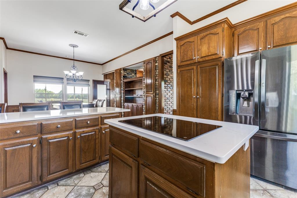 2525 Private Road 6040 Blue Ridge, TX 75424 - Photo 8 of 40 a kitchen with a sink and stainless steel appliances