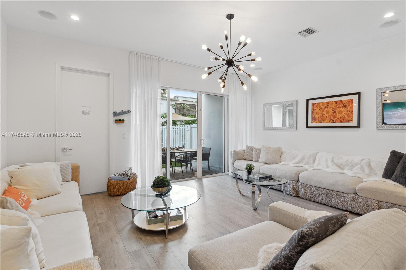 3570 Southwest 23rd Street, Unit 3570 Miami, FL 33145 - Photo 12 of 40 a living room with furniture and white walls