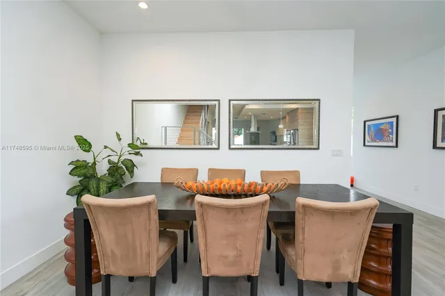 a view of a backyard with swimming pool