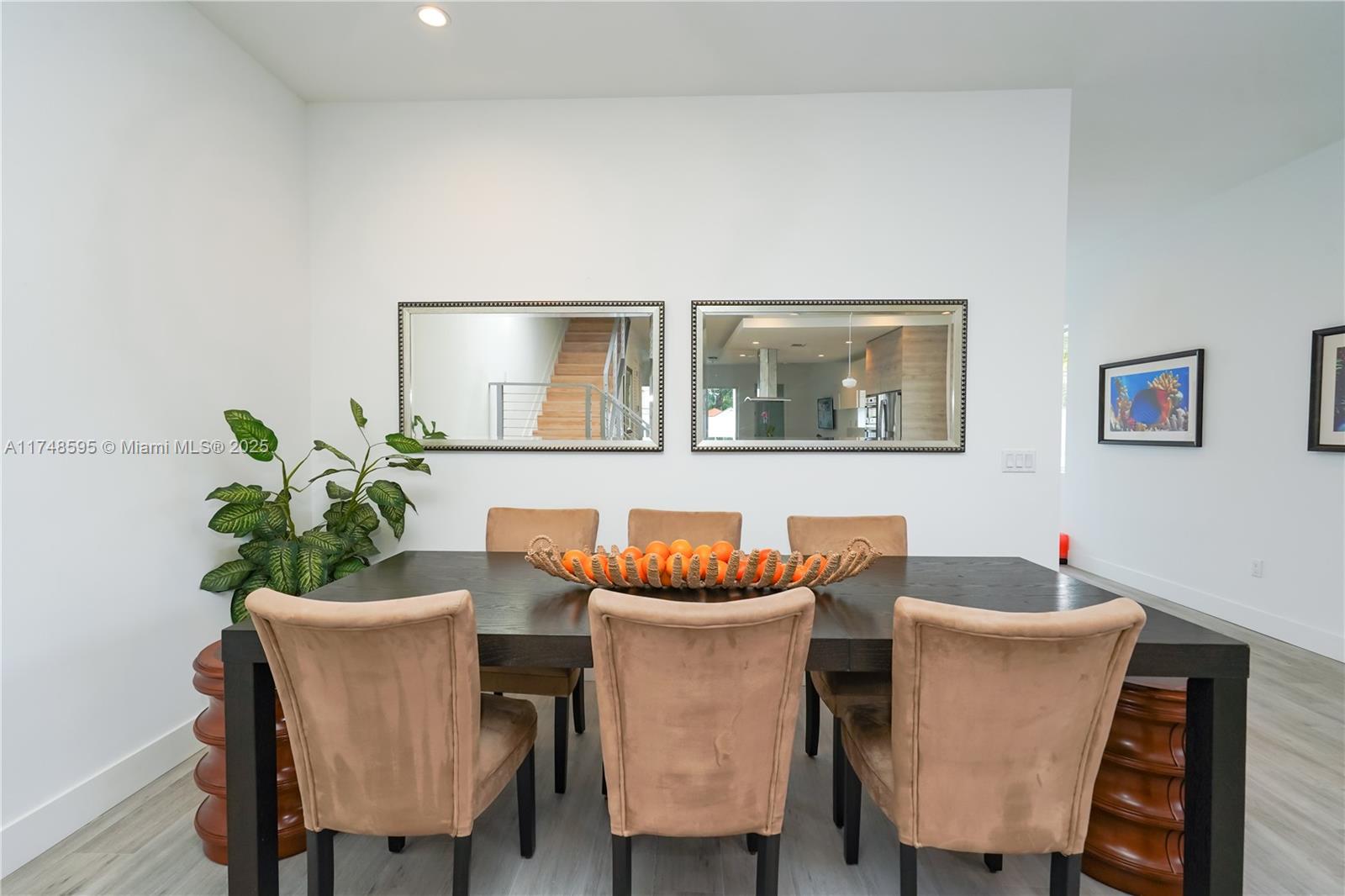 3570 Southwest 23rd Street, Unit 3570 Miami, FL 33145 - Photo 30 of 40 a dining room with furniture and wooden floor