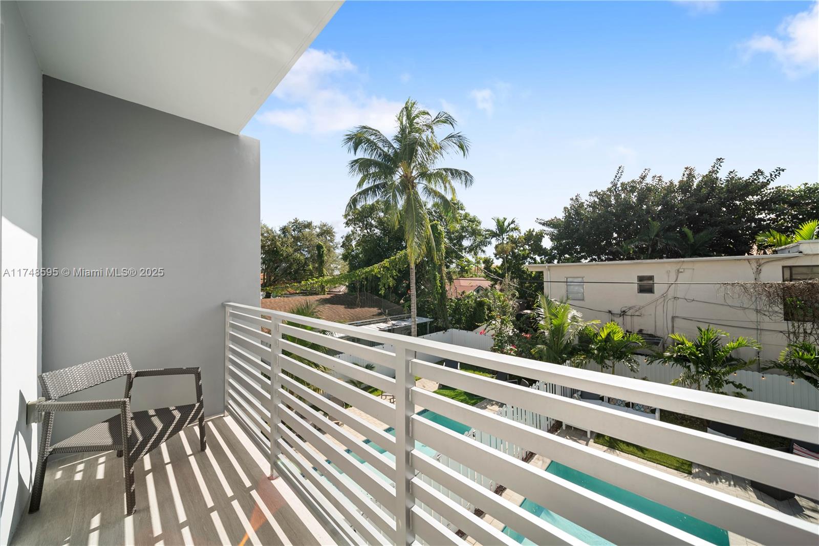 3570 Southwest 23rd Street, Unit 3570 Miami, FL 33145 - Photo 4 of 40 a view of balcony with wooden floor and outdoor space