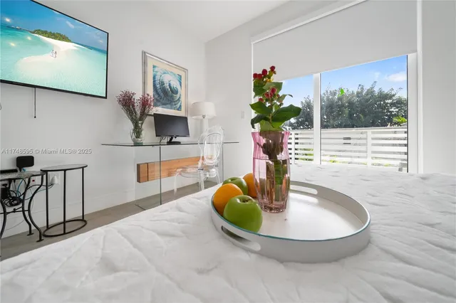 a vase of flowers sitting on a table