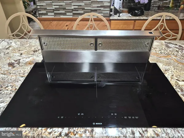 a white refrigerator freezer sitting inside of a kitchen