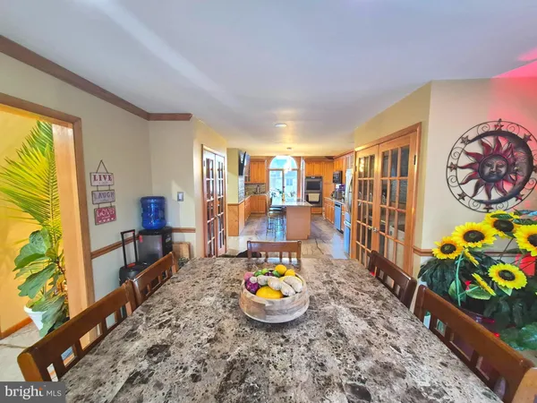 a living room with furniture and a table