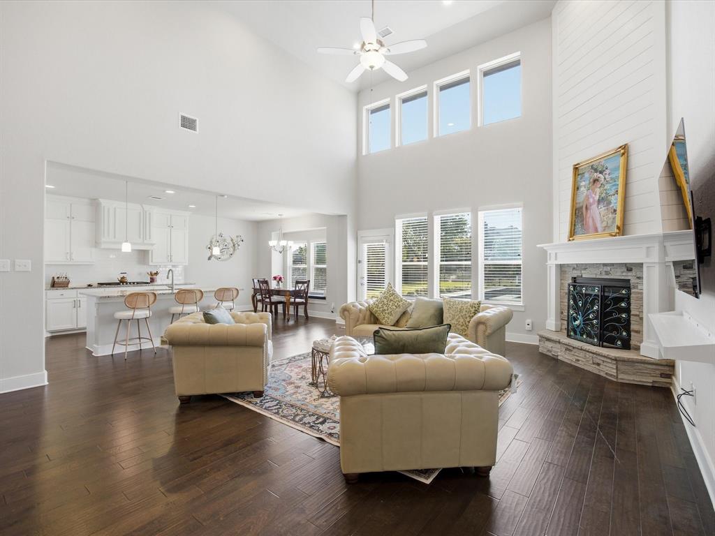 146 Old Bridge Road Waxahachie, TX 75165 - Photo 13 of 40 a living room with furniture and a fireplace