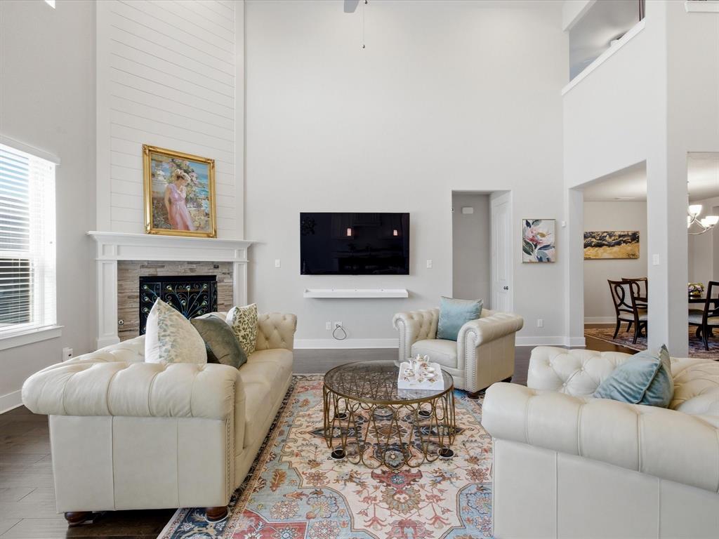 146 Old Bridge Road Waxahachie, TX 75165 - Photo 15 of 40 a living room with furniture and a fireplace
