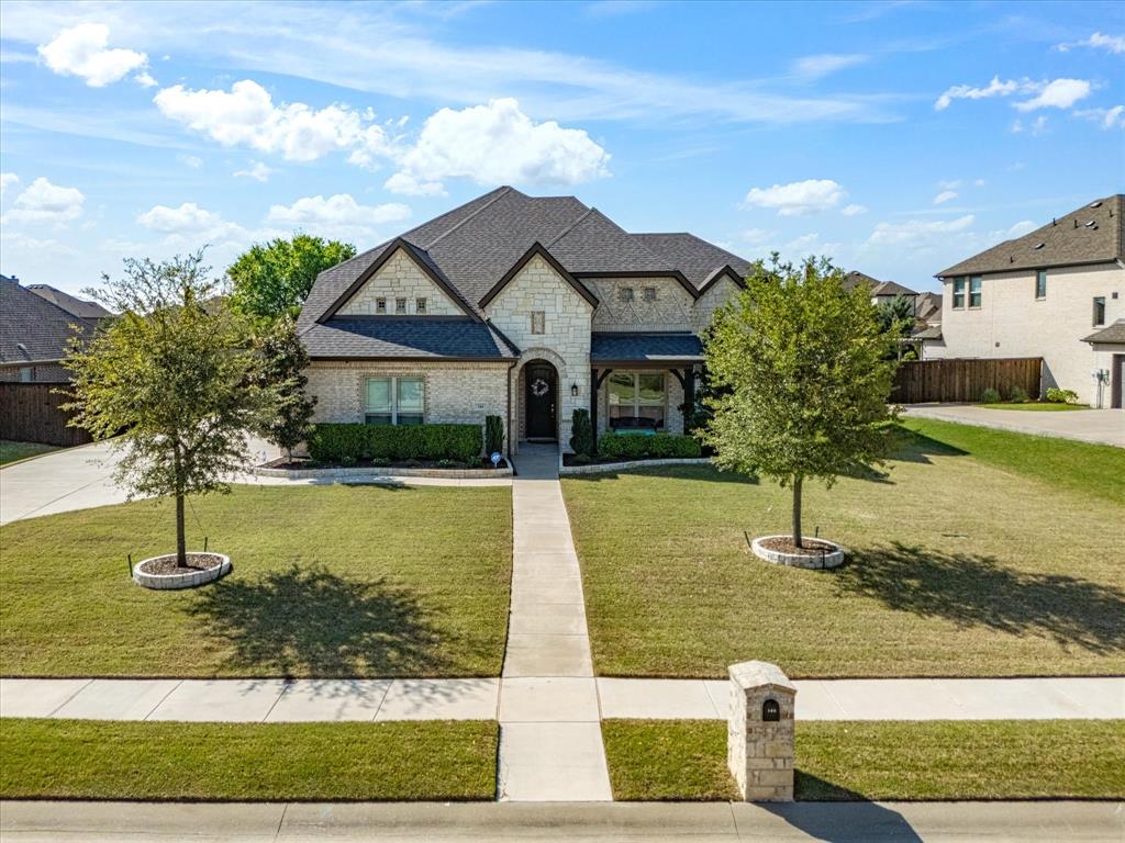146 Old Bridge Road Waxahachie, TX 75165 - Photo 2 of 40 a front view of a house with a yard