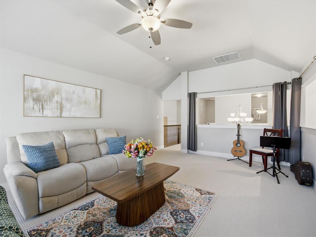 146 Old Bridge Road Waxahachie, TX 75165 - Photo 29 of 40 a living room with furniture and wooden floor