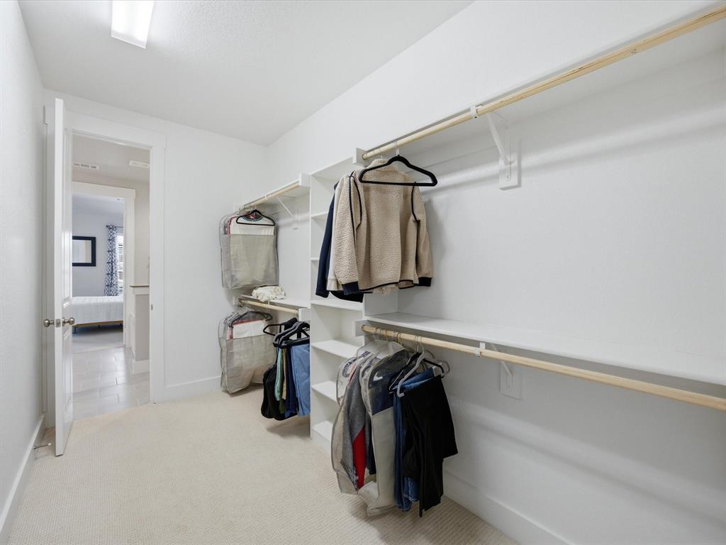 146 Old Bridge Road Waxahachie, TX 75165 - Photo 30 of 40 a view of walk in closet with clothes and shoes