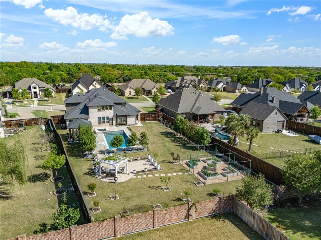 146 Old Bridge Road Waxahachie, TX 75165 - Photo 33 of 40 an aerial view of multiple houses with yard