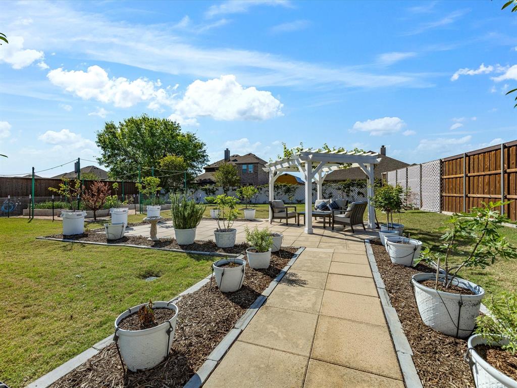 146 Old Bridge Road Waxahachie, TX 75165 - Photo 35 of 40 a view of a swimming pool and lounge chairs