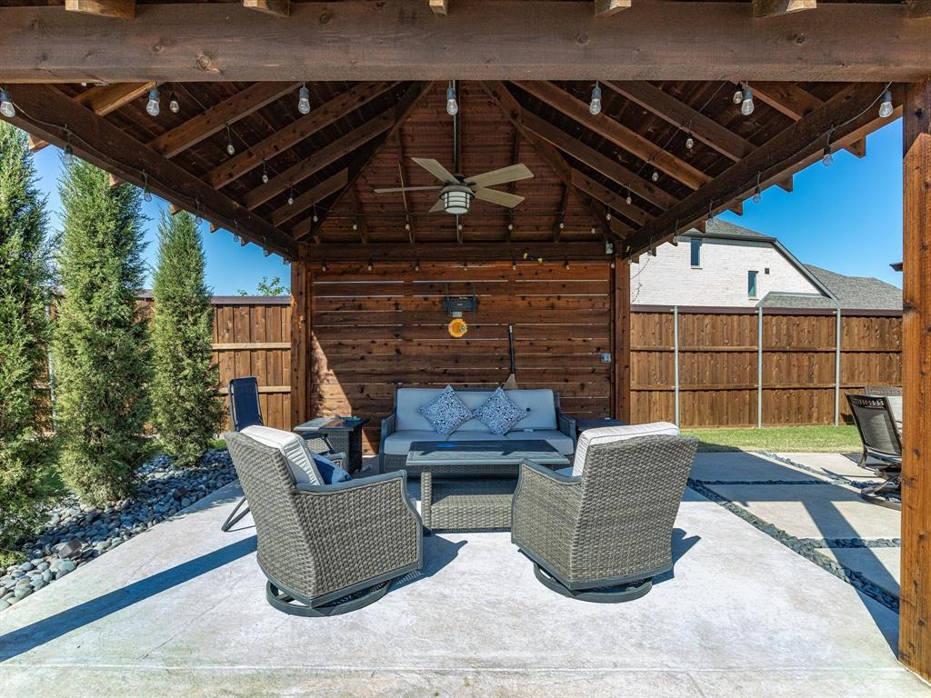 146 Old Bridge Road Waxahachie, TX 75165 - Photo 37 of 40 a view of a patio with couches chairs and wooden floor