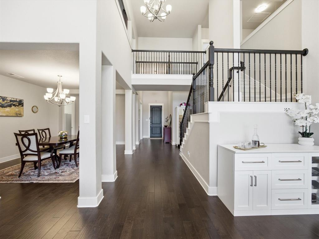 146 Old Bridge Road Waxahachie, TX 75165 - Photo 9 of 40 a view of a hallway with furniture and wooden floor