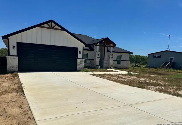 a house view with a outdoor space