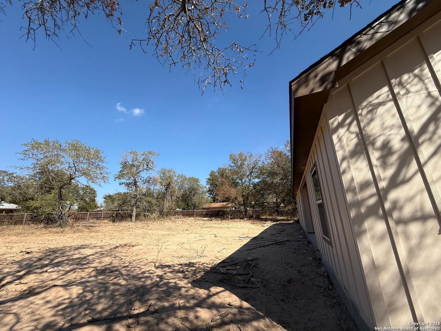 48 Grey Fox Poteet, TX 78065 - Photo 14 of 16 a view of swimming pool with a yard