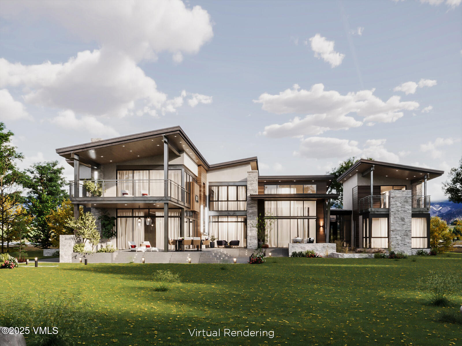 84 Tallgrass Gypsum, CO 81637 - Photo 2 of 13 a view of a big house with a big yard and large trees