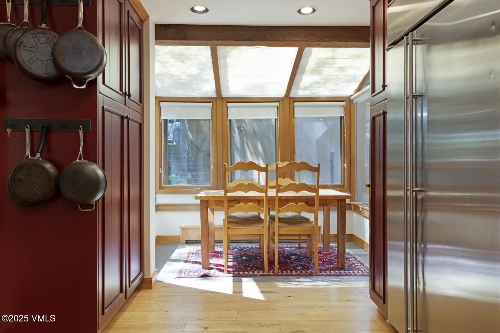 2111 Vermont Road, Unit A Vail, CO 81657 - Photo 20 of 46 a view of living room with furniture and floor to ceiling window