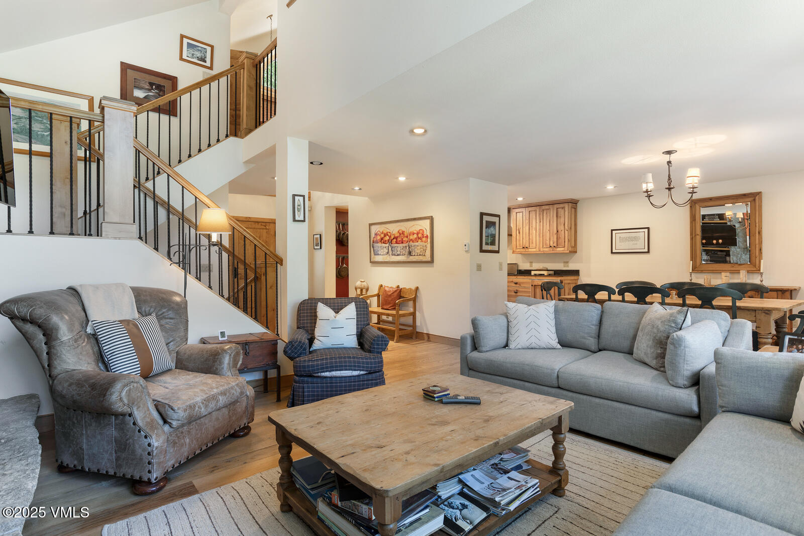 2111 Vermont Road, Unit A Vail, CO 81657 - Photo 23 of 46 a living room with furniture kitchen view and a table