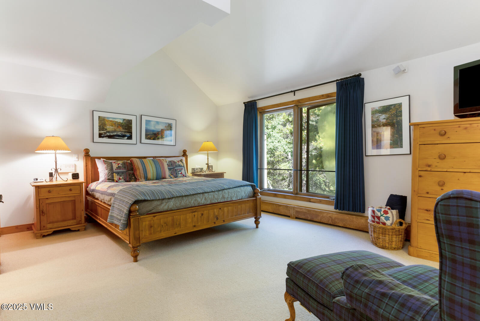 2111 Vermont Road, Unit A Vail, CO 81657 - Photo 26 of 46 a bedroom with a bed chair and window