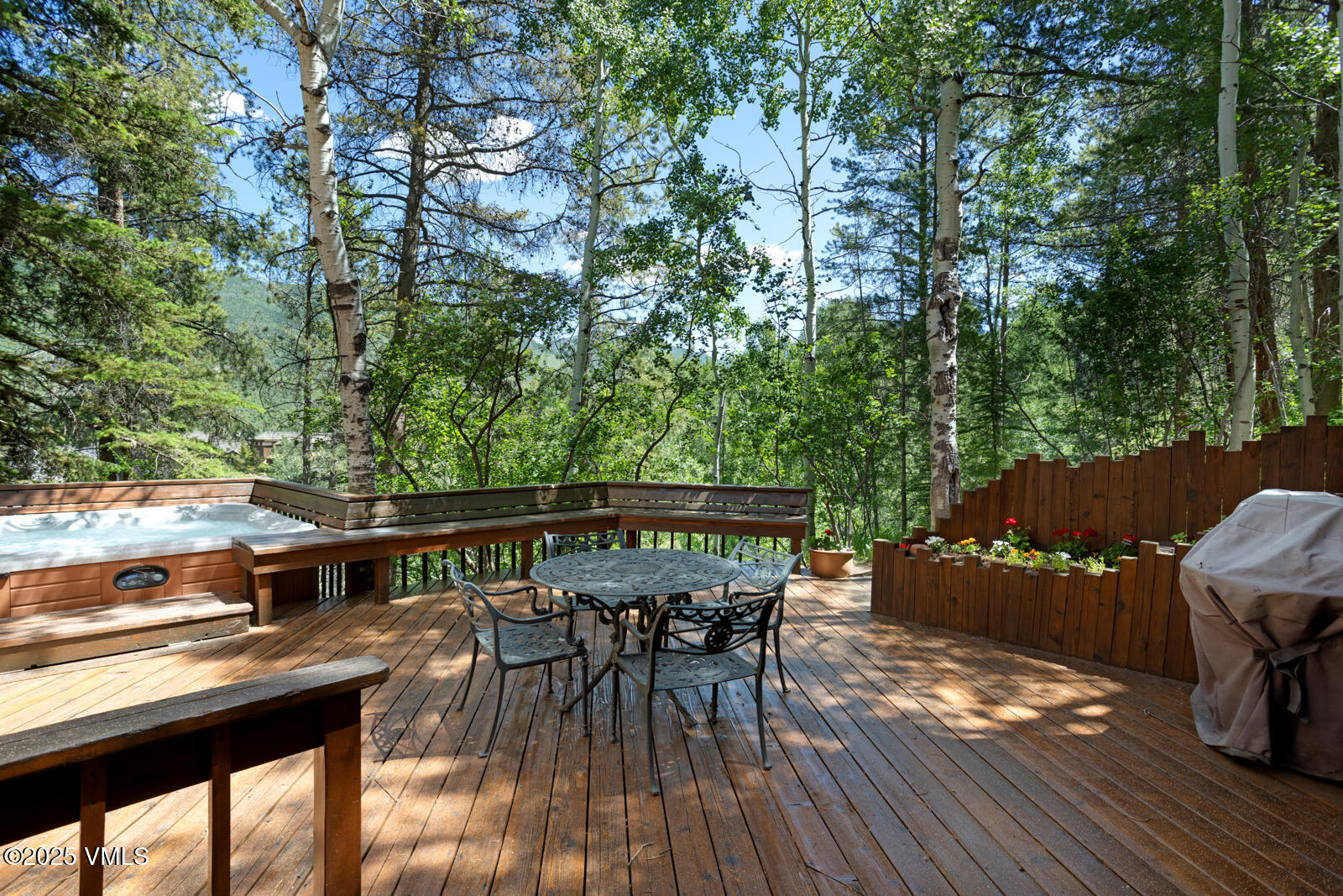 2111 Vermont Road, Unit A Vail, CO 81657 - Photo 46 of 46 a balcony with wooden floor table and chairs
