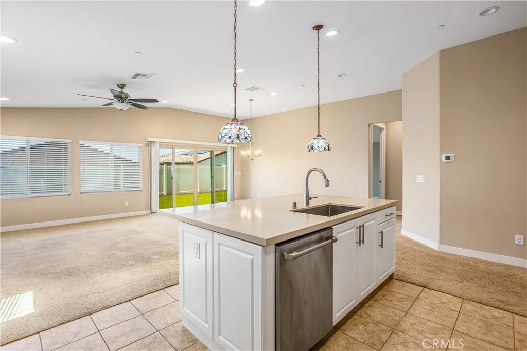 1567 Park Haven Drive Rialto, CA 92376 - Photo 8 of 35 Kitchen Island & Family Room