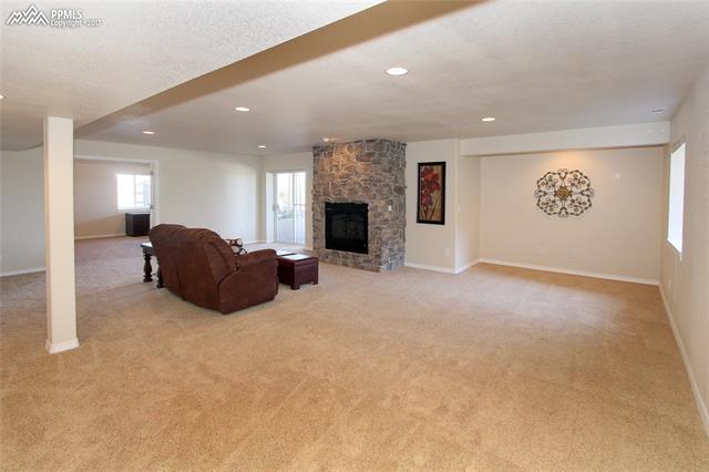 12010 Rio Secco Road Peyton, CO 80831 - Photo 17 of 36 A basement that doesn't feel like a basement! Light, bright and wide open...the possibilities are endless