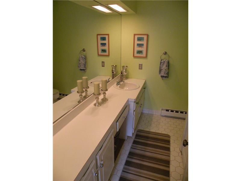377 Glenbrook Road Stamford, CT 06906 - Photo 14 of 15 a bathroom with a sink and a mirror