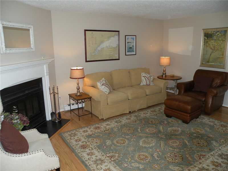 377 Glenbrook Road Stamford, CT 06906 - Photo 4 of 15 a living room with furniture and a fireplace