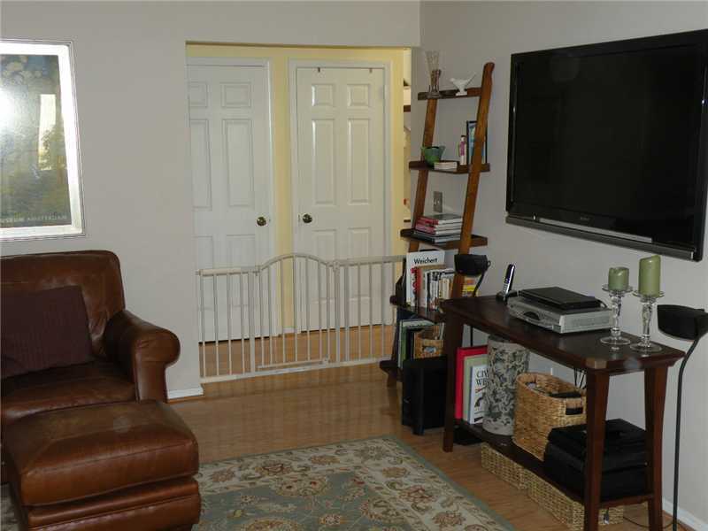 377 Glenbrook Road Stamford, CT 06906 - Photo 5 of 15 a living room with furniture and a flat screen tv