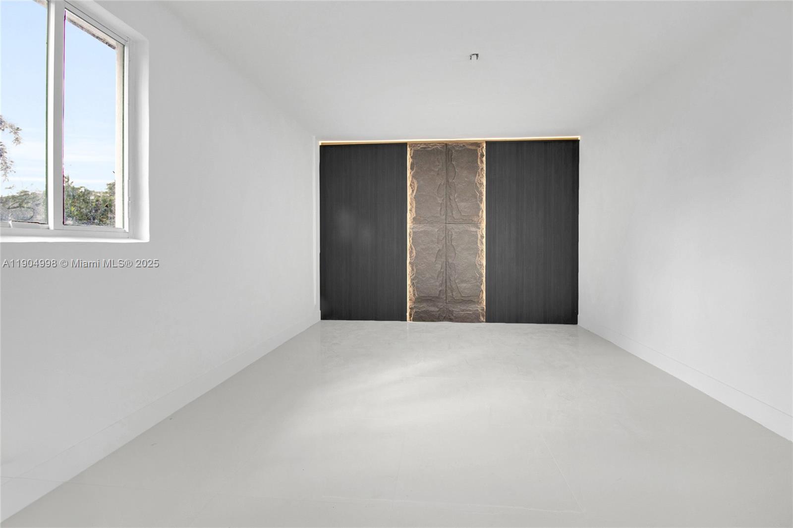 425 Southwest 129th Avenue Miami, FL 33184 - Photo 11 of 24 a view of an empty room with a window