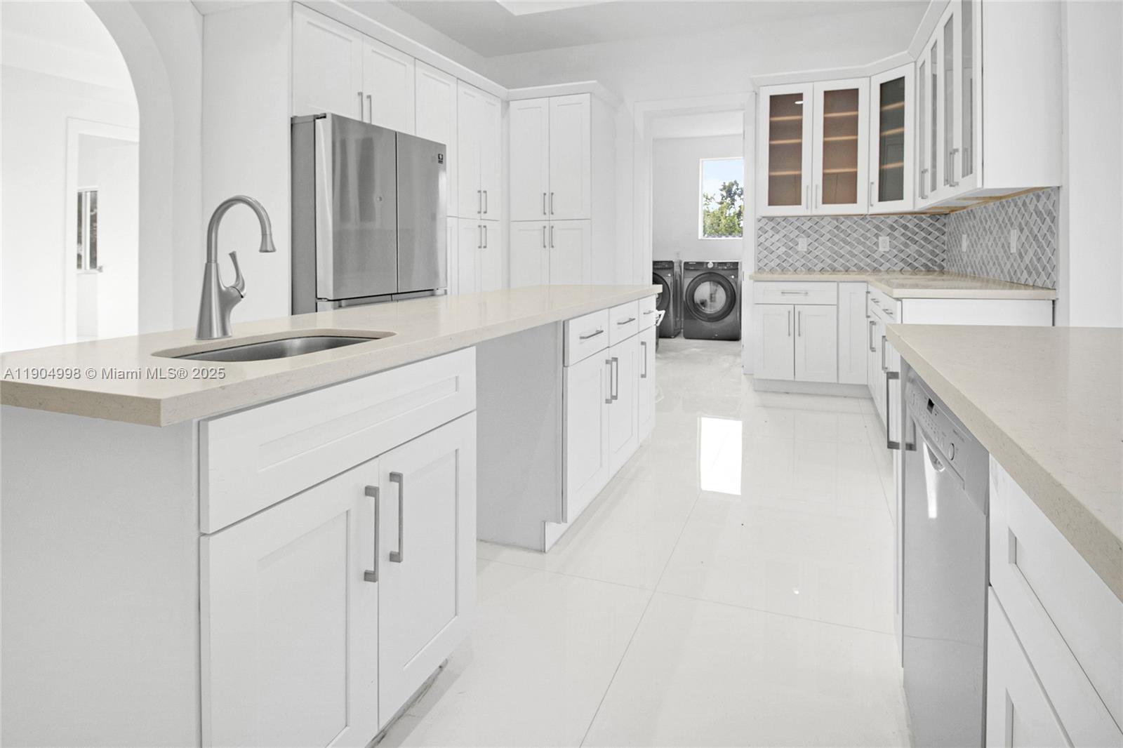 425 Southwest 129th Avenue Miami, FL 33184 - Photo 8 of 24 a view of a kitchen with a sink