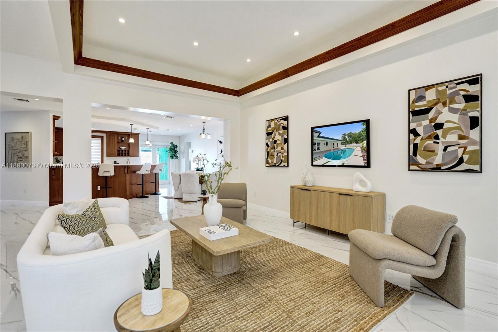 300 North 53 Avenue Hollywood, FL 33021 - Photo 11 of 77 a living room with furniture and a wooden floor