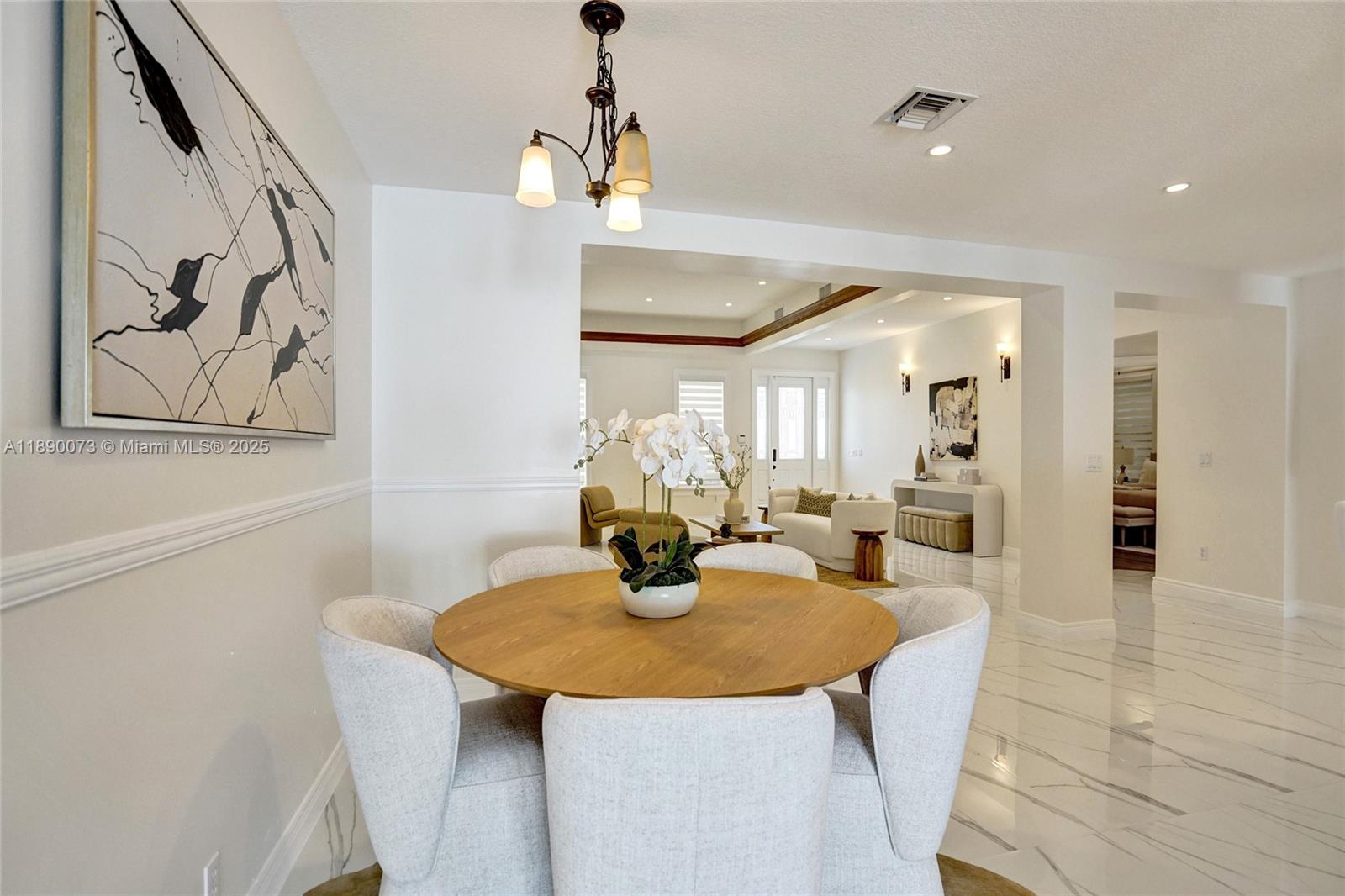 300 North 53 Avenue Hollywood, FL 33021 - Photo 15 of 77 a view of a dining room with furniture and wooden floor