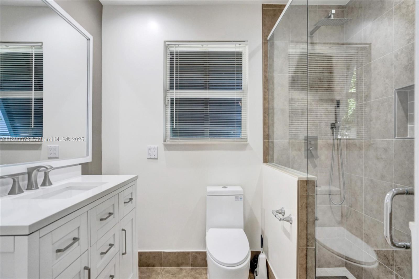 300 North 53 Avenue Hollywood, FL 33021 - Photo 37 of 77 a bathroom with a sink a toilet and shower