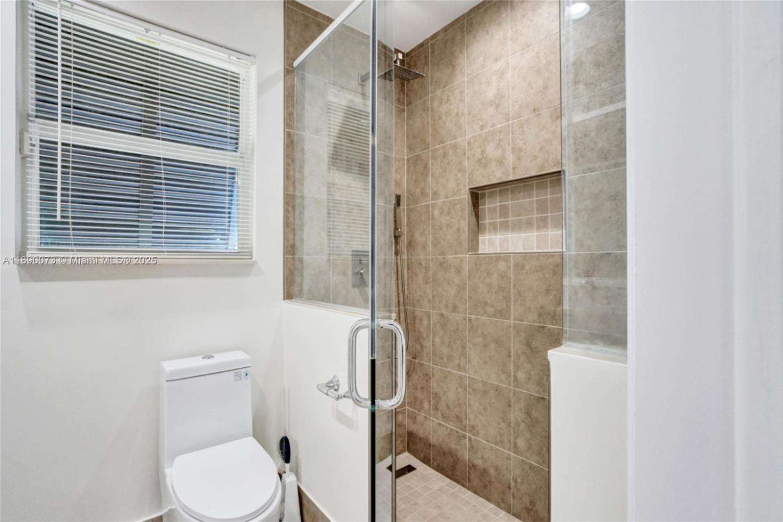 300 North 53 Avenue Hollywood, FL 33021 - Photo 38 of 77 a bathroom with a toilet and a shower