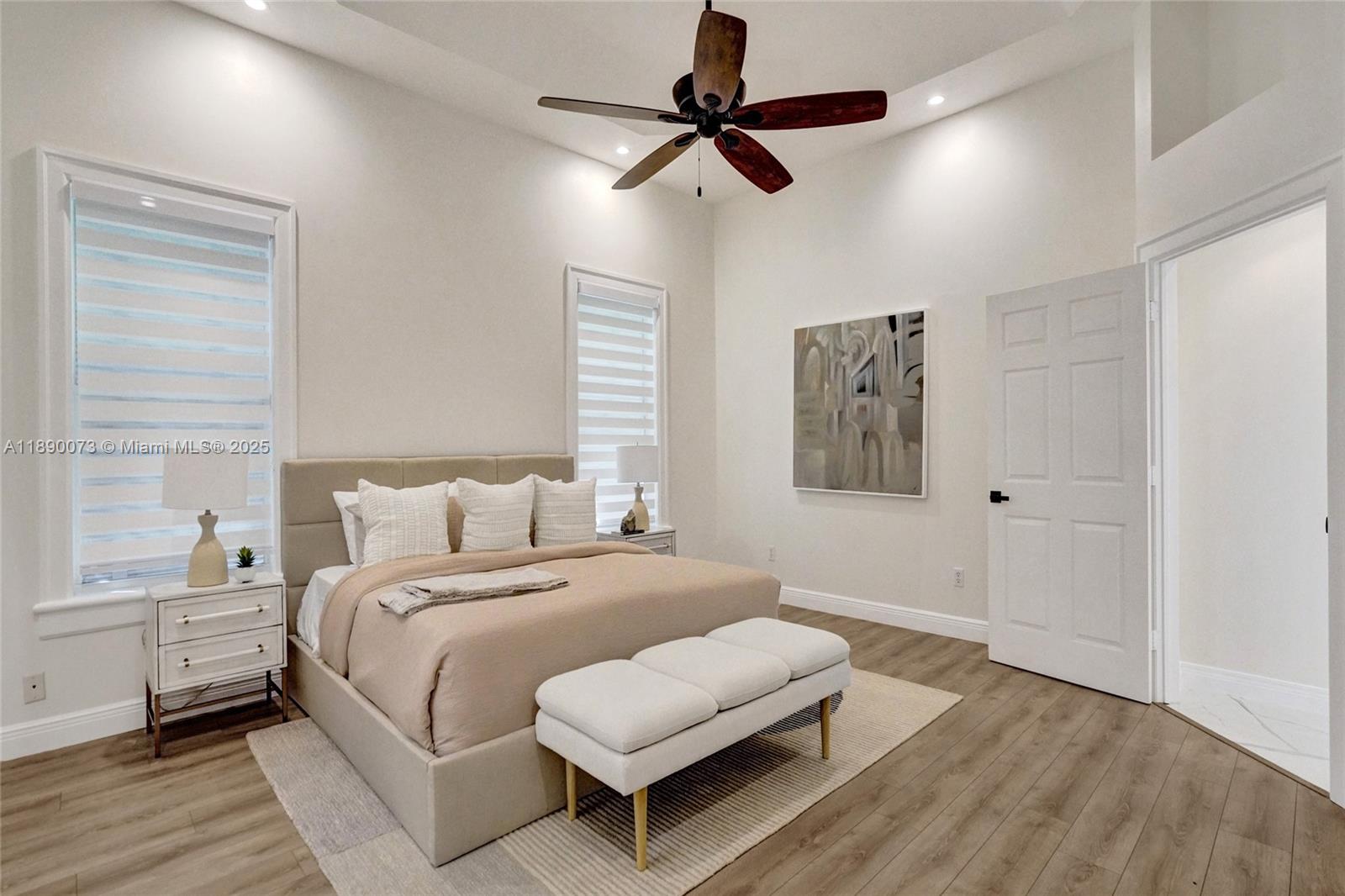 300 North 53 Avenue Hollywood, FL 33021 - Photo 43 of 77 a bedroom with a bed couch and a window