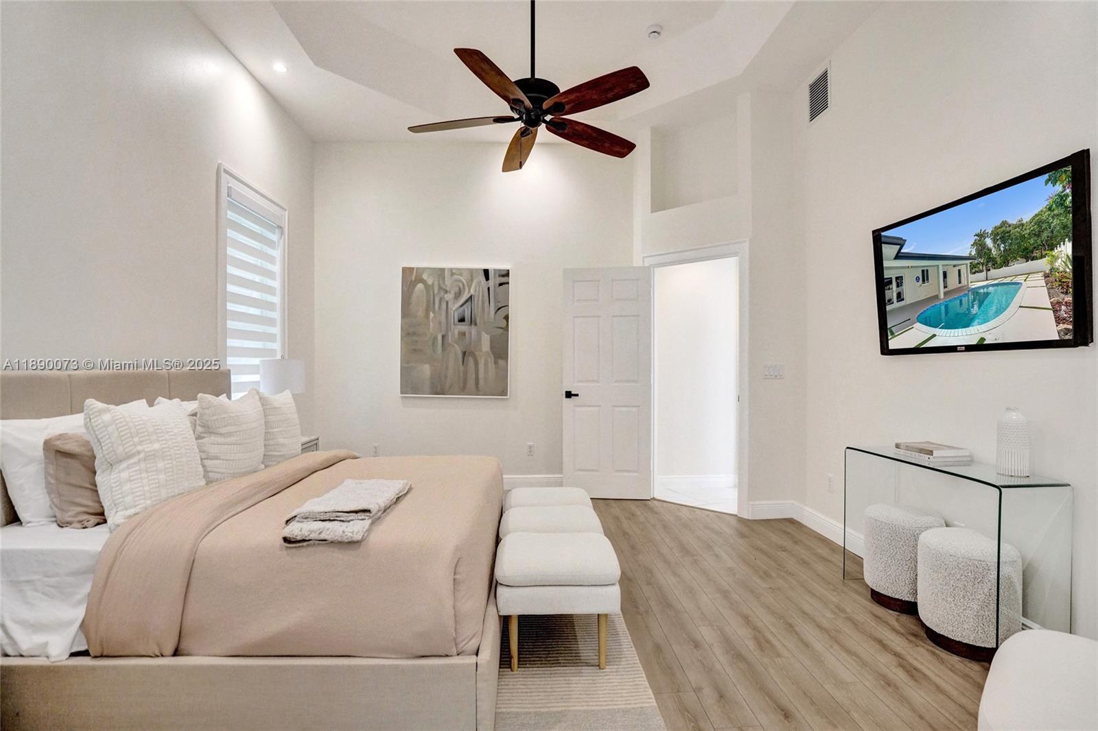 300 North 53 Avenue Hollywood, FL 33021 - Photo 44 of 77 a bedroom with a bed and a couch