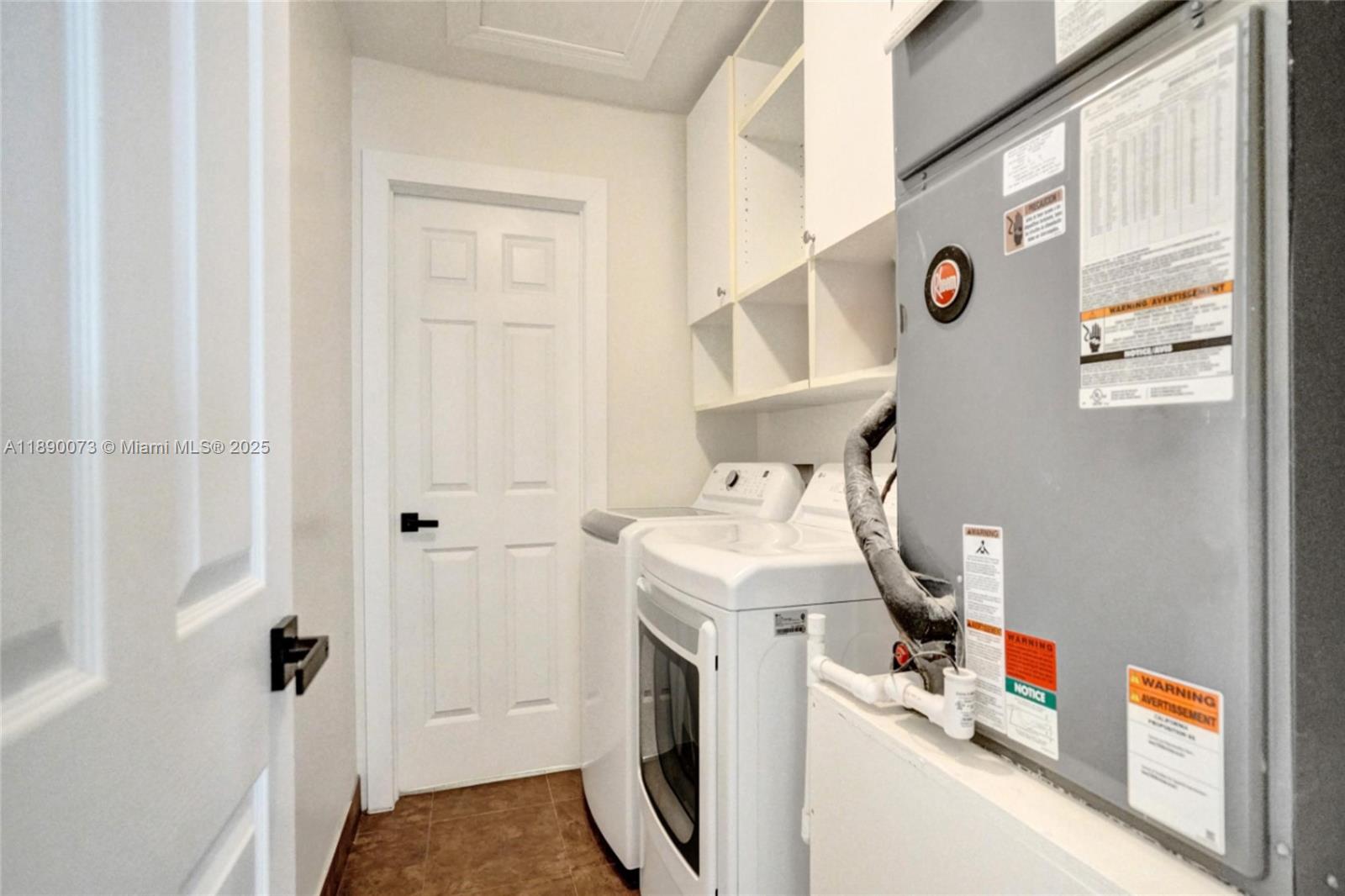 300 North 53 Avenue Hollywood, FL 33021 - Photo 51 of 77 a utility room with dryer and washer