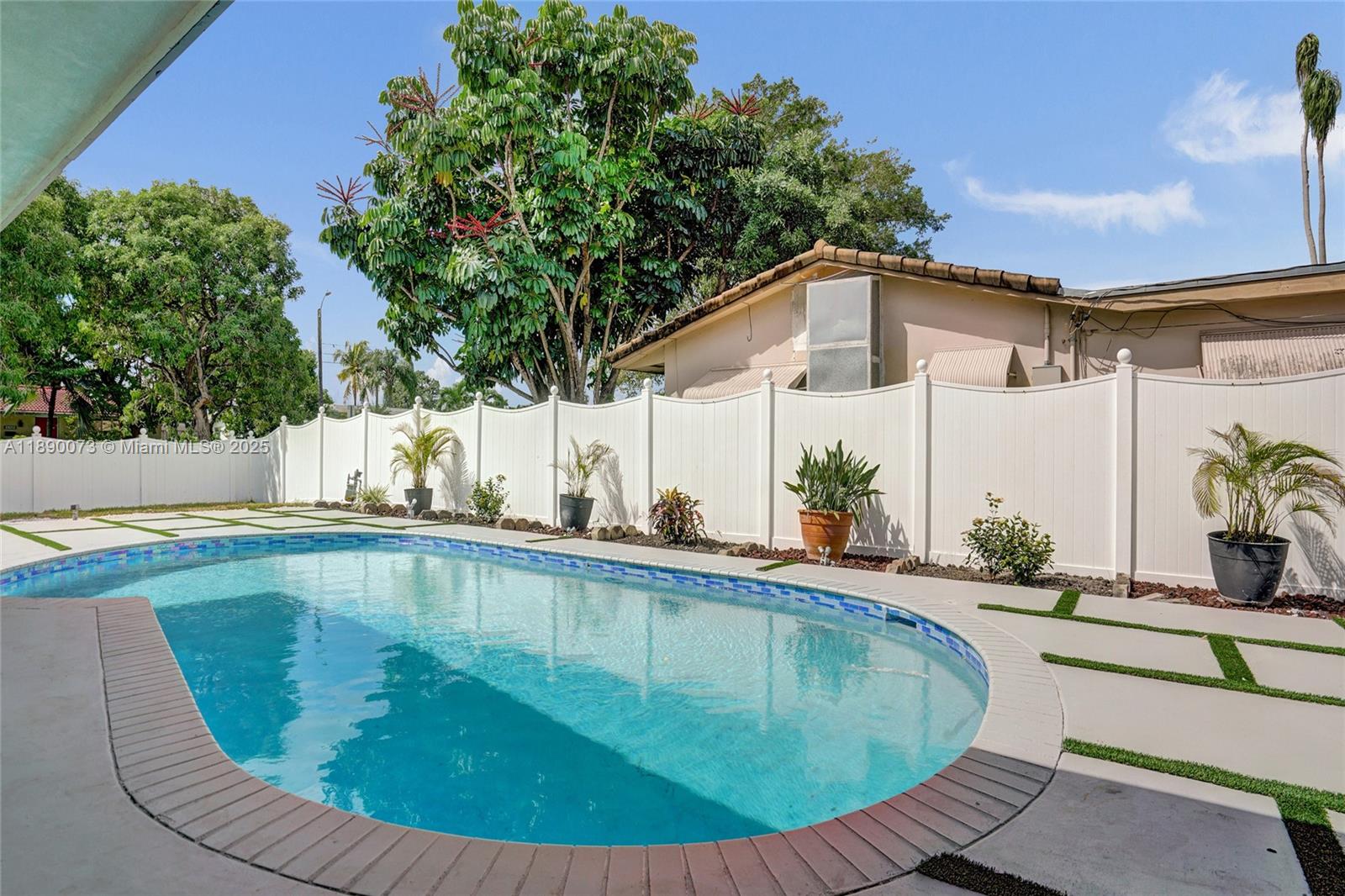 300 North 53 Avenue Hollywood, FL 33021 - Photo 56 of 77 a view of a house with swimming pool