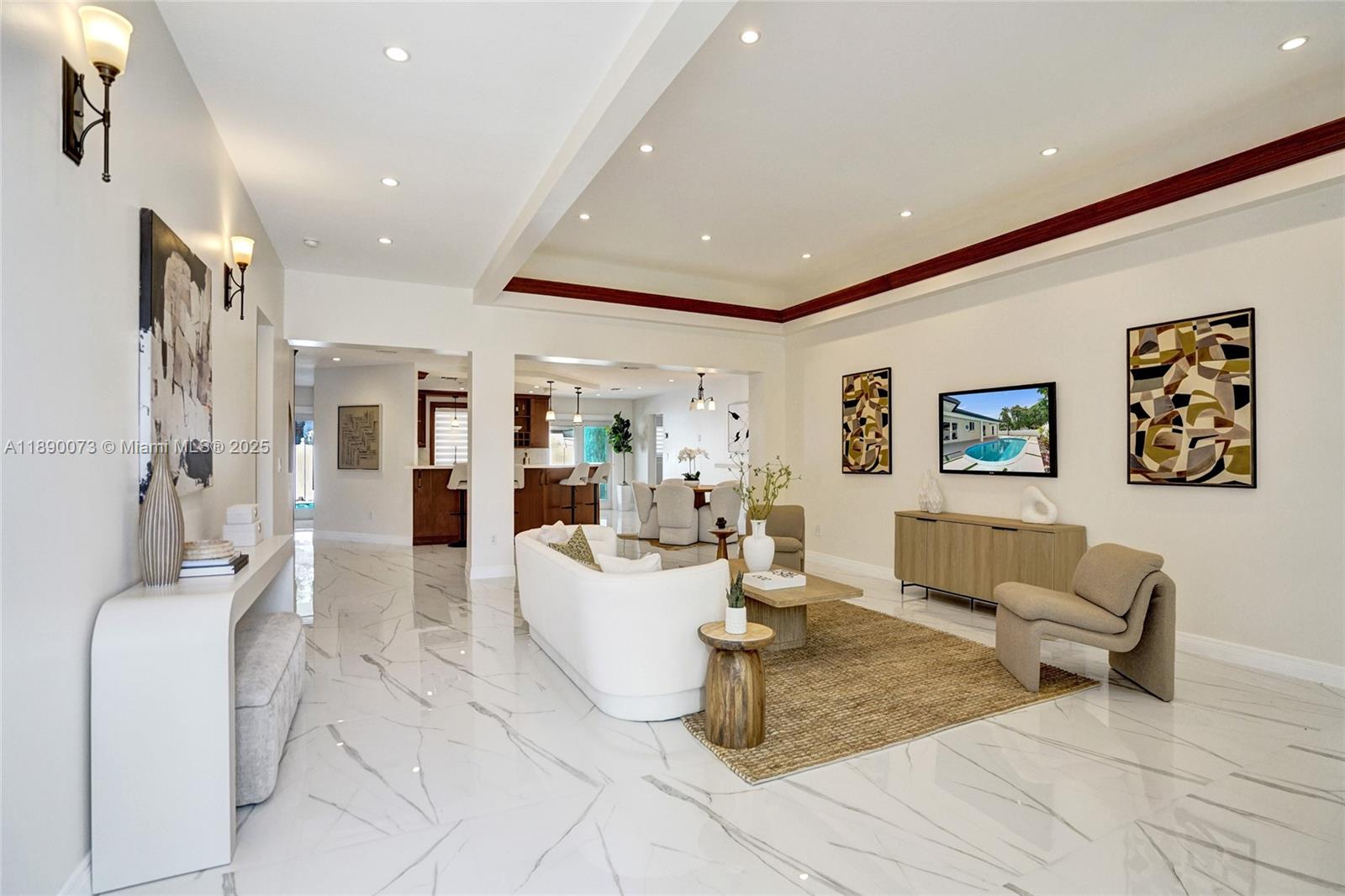 300 North 53 Avenue Hollywood, FL 33021 - Photo 9 of 77 a living room with furniture and a table