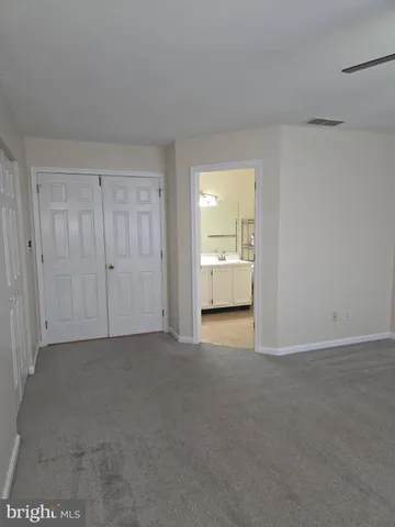 a view of a room with an empty space