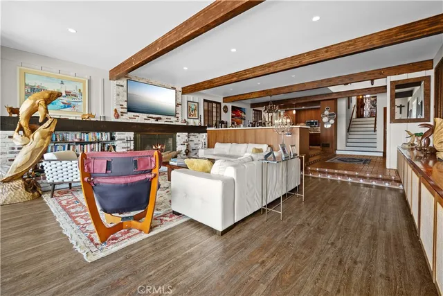 a view of a living room and dining room