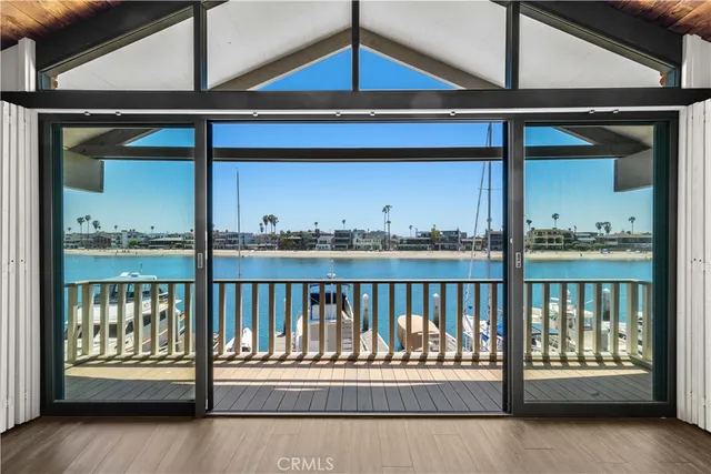 a view of a balcony with furniture