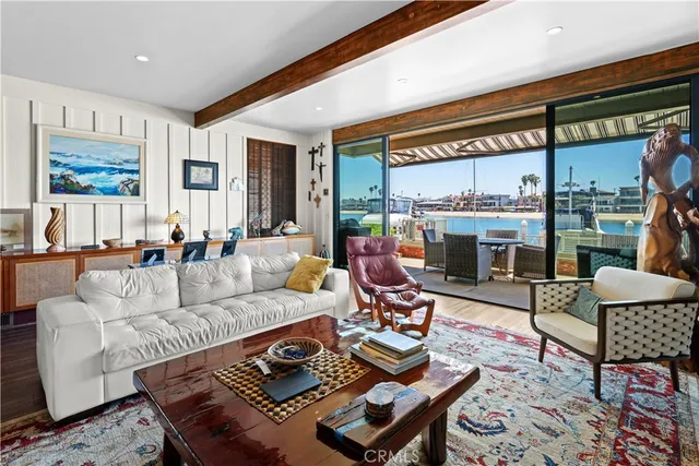 a living room with furniture fireplace and a flat screen tv